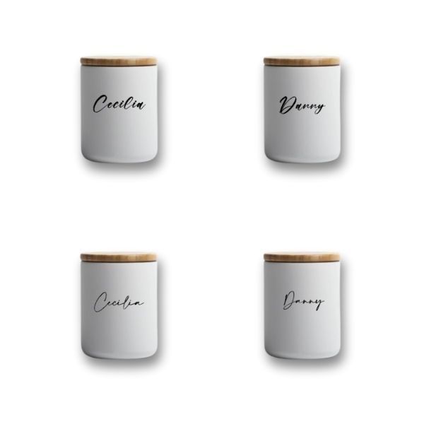 Four white ceramic jars with bamboo lids, each featuring a name in cursive: 'Cecilia' and 'Danny' appear twice, one set in the top row and the other in the bottom row.