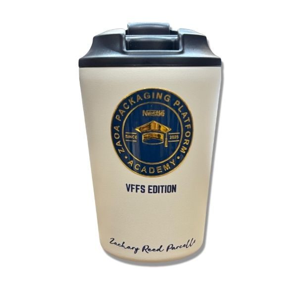White Nestlé branded tumbler with a black lid, featuring the ZAOA Packaging Platform Academy logo, 'VFFS Edition' text, and 'Zachary Reed Parcells' name printed on it.